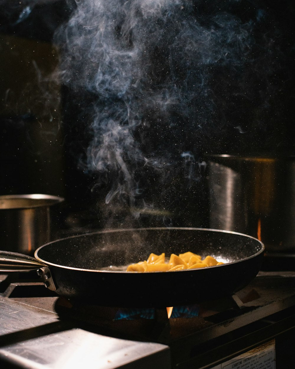 Pots and pans on a kitchen stovetop